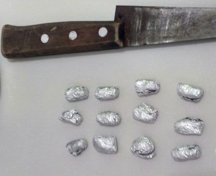 Arma e droga em poder do suspeito
